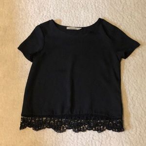 Black short sleeve blouse in a medium from Liberty Love